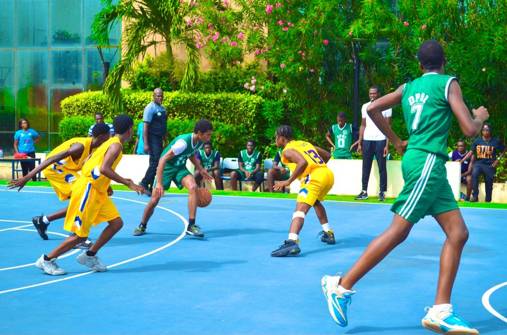Students playing football on the school field