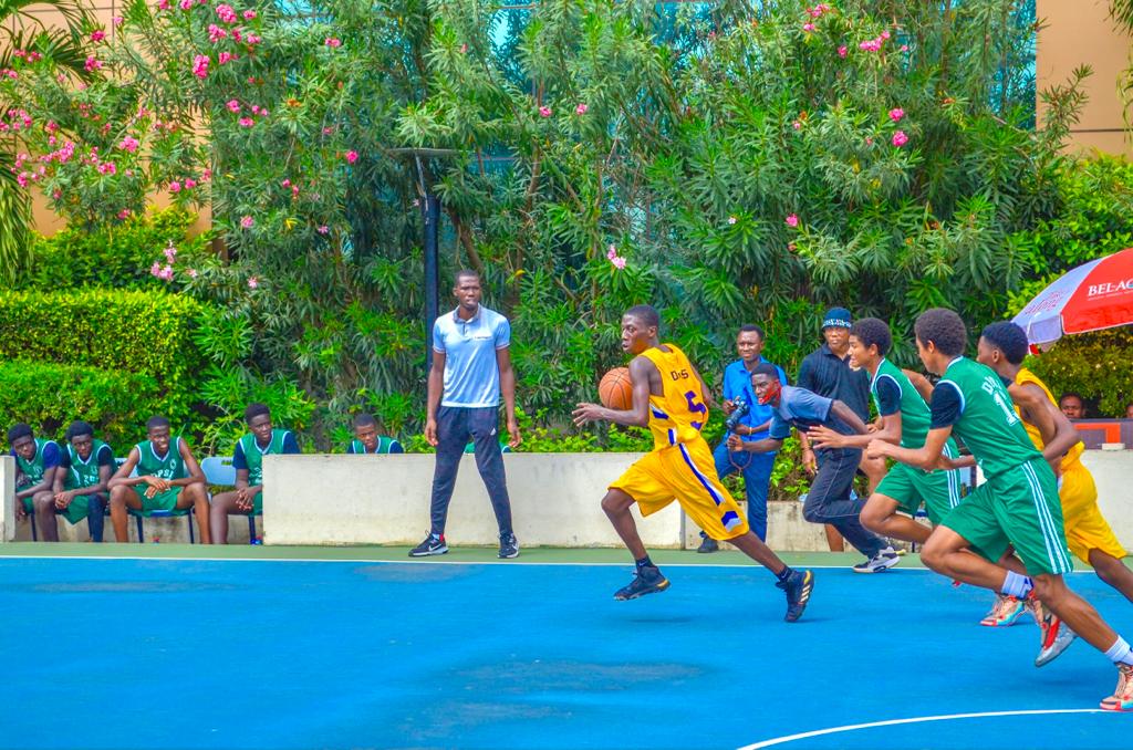 Robotics club members assembling a robot